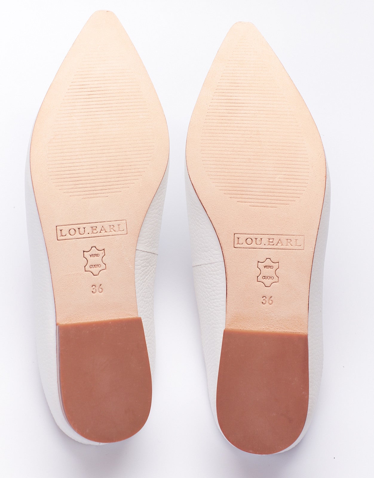 pointed toe slip on mules for women with a leather sole and tumbled leather upper.